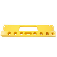 Yellow, plastic fascia plate with a rectangular cut out for a display and several round holes in the front.